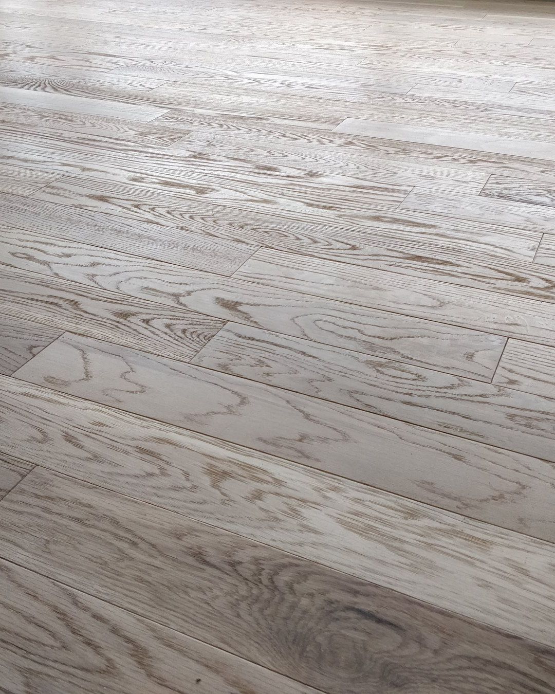 Detalle de un piso de madera de roble.